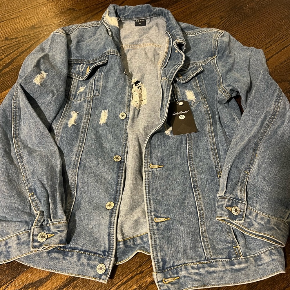 Brand new Distressed Jean jacket